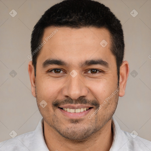 Joyful white young-adult male with short  black hair and brown eyes