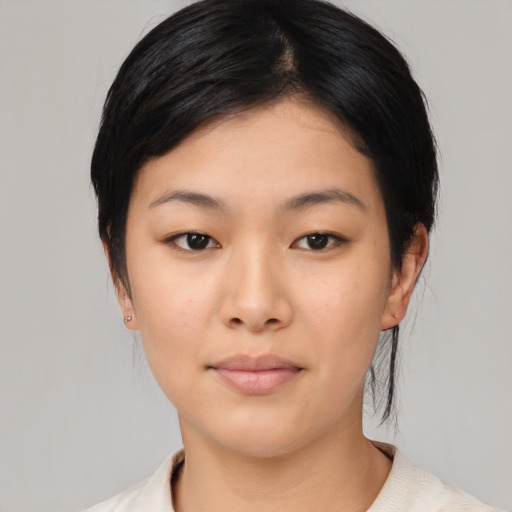 Neutral asian young-adult female with medium  black hair and brown eyes