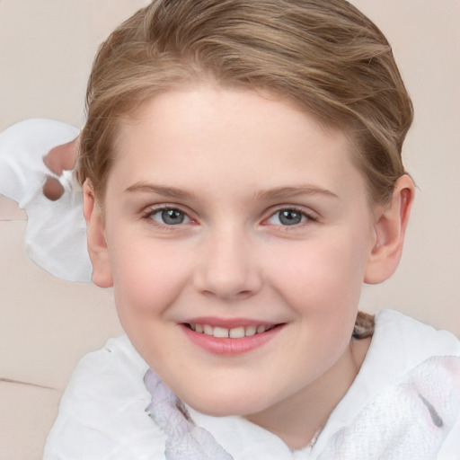 Joyful white child female with short  brown hair and blue eyes