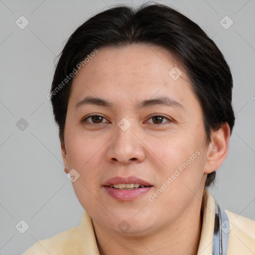 Joyful white adult female with medium  brown hair and brown eyes