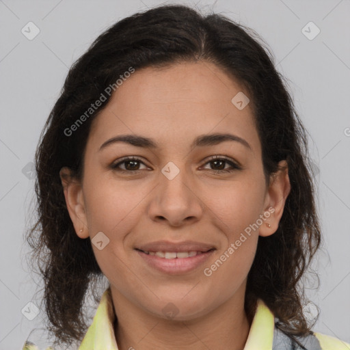 Joyful latino young-adult female with medium  brown hair and brown eyes