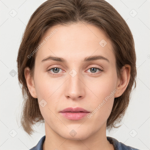 Neutral white young-adult female with medium  brown hair and grey eyes