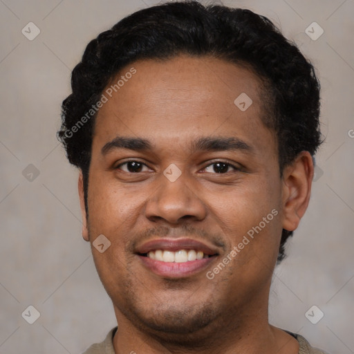 Joyful latino young-adult male with short  brown hair and brown eyes