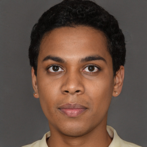 Neutral black young-adult male with short  black hair and brown eyes