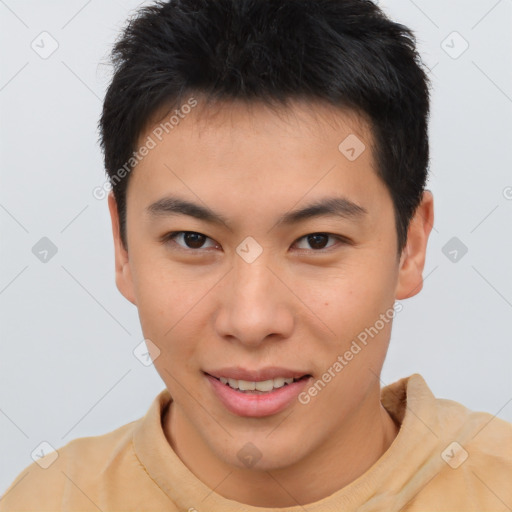 Joyful asian young-adult male with short  brown hair and brown eyes