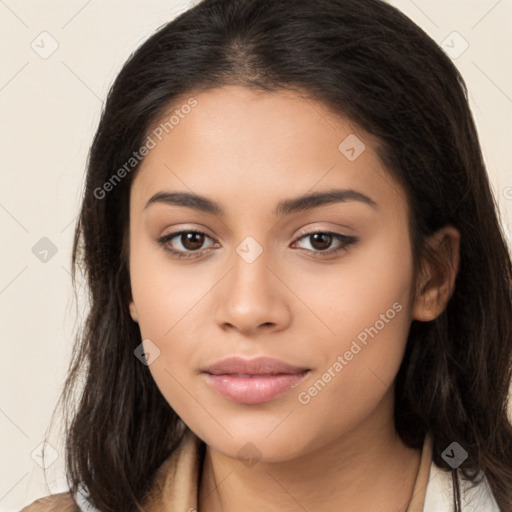 Joyful latino young-adult female with long  brown hair and brown eyes