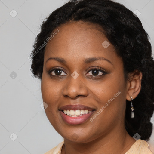 Joyful black young-adult female with medium  black hair and brown eyes