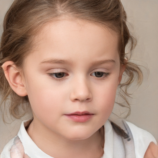 Neutral white child female with medium  brown hair and brown eyes