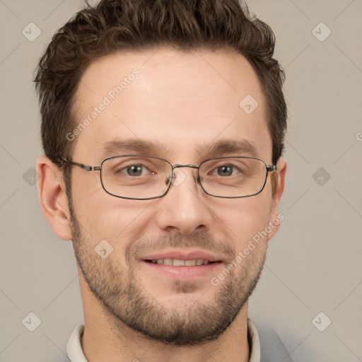 Joyful white adult male with short  brown hair and grey eyes