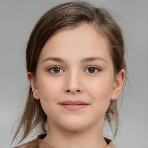 Joyful white child female with medium  brown hair and brown eyes