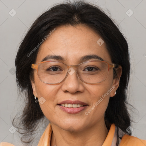 Joyful white adult female with medium  brown hair and brown eyes