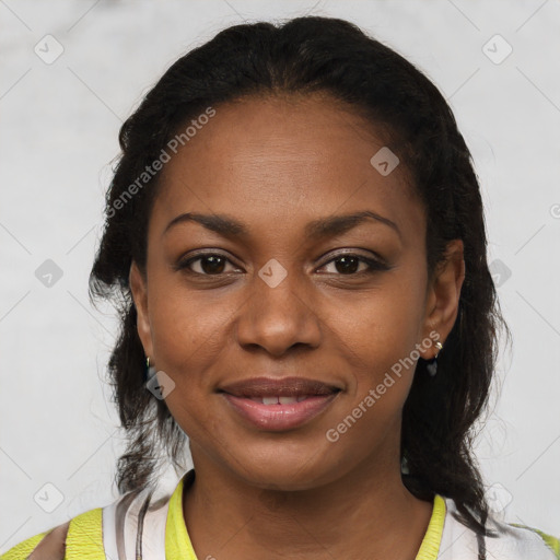 Joyful black young-adult female with medium  brown hair and brown eyes