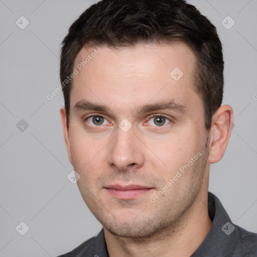 Neutral white young-adult male with short  brown hair and grey eyes