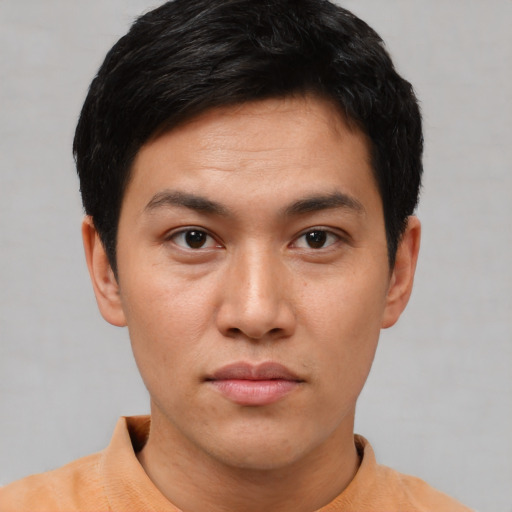 Neutral asian young-adult male with short  black hair and brown eyes