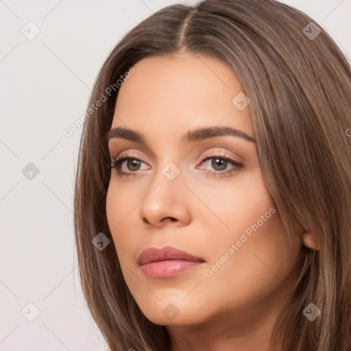 Neutral white young-adult female with long  brown hair and brown eyes