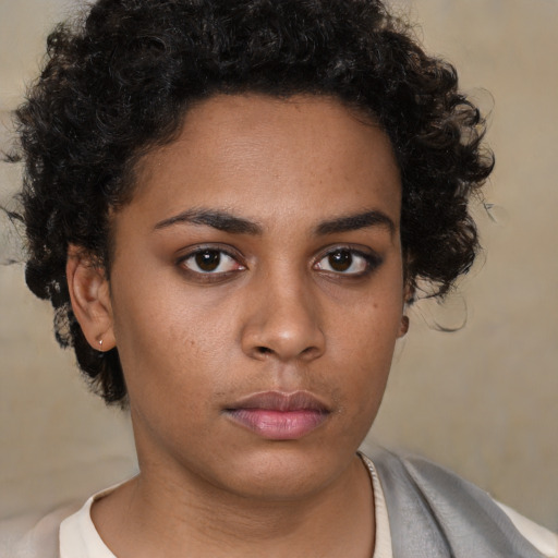 Neutral black young-adult female with short  brown hair and brown eyes