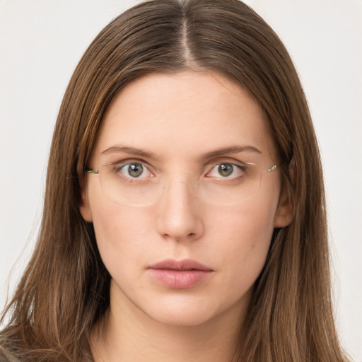 Neutral white young-adult female with long  brown hair and grey eyes