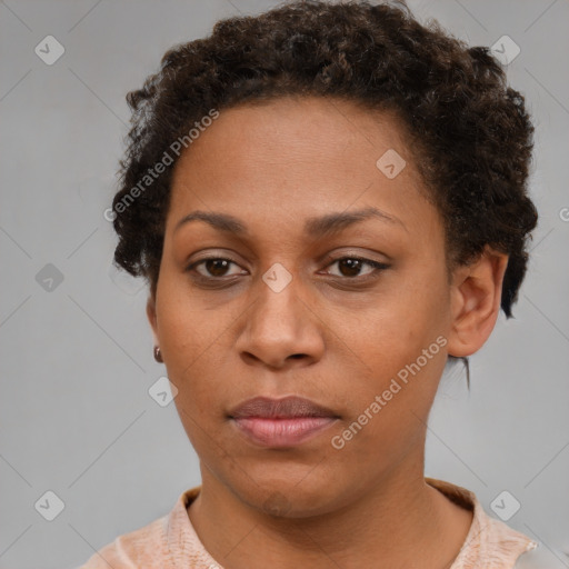 Neutral black young-adult female with short  brown hair and brown eyes