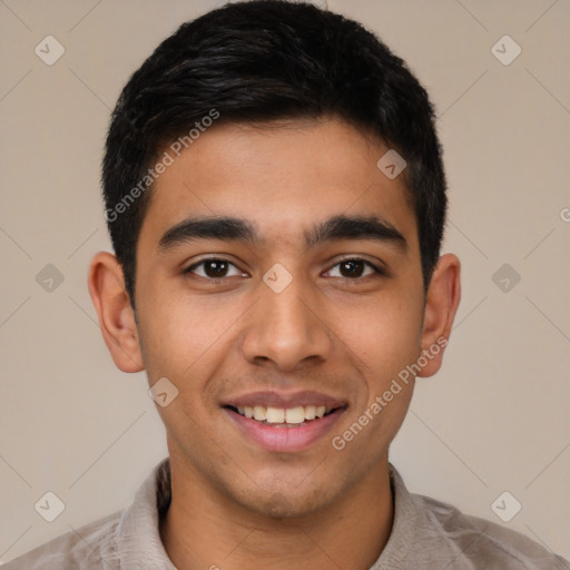 Joyful latino young-adult male with short  black hair and brown eyes