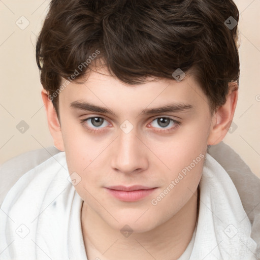 Joyful white child male with short  brown hair and brown eyes