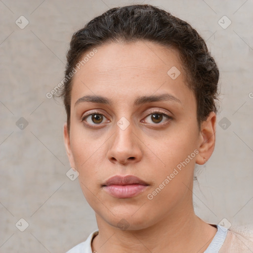 Neutral white young-adult female with short  brown hair and brown eyes