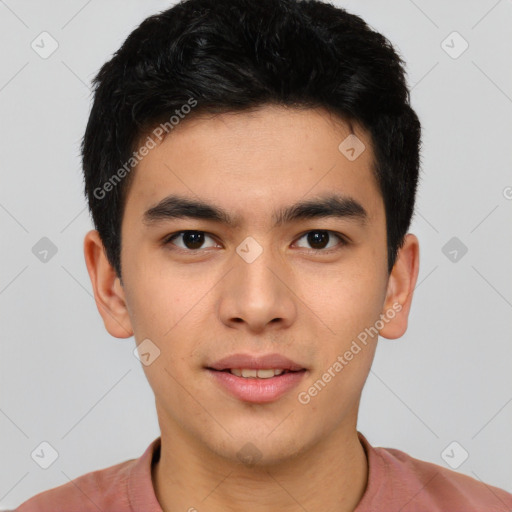 Joyful asian young-adult male with short  brown hair and brown eyes