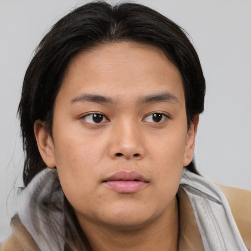 Neutral asian young-adult female with medium  brown hair and brown eyes