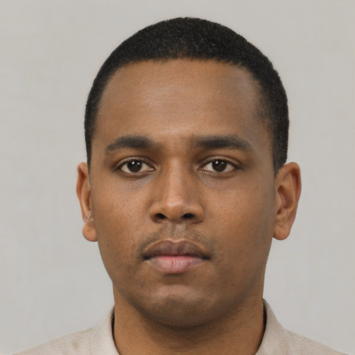 Neutral black young-adult male with short  black hair and brown eyes