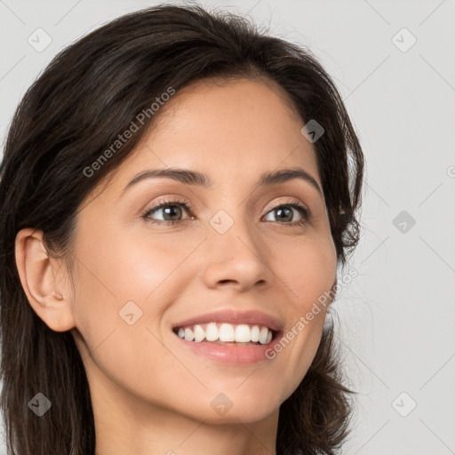 Joyful white young-adult female with long  brown hair and brown eyes