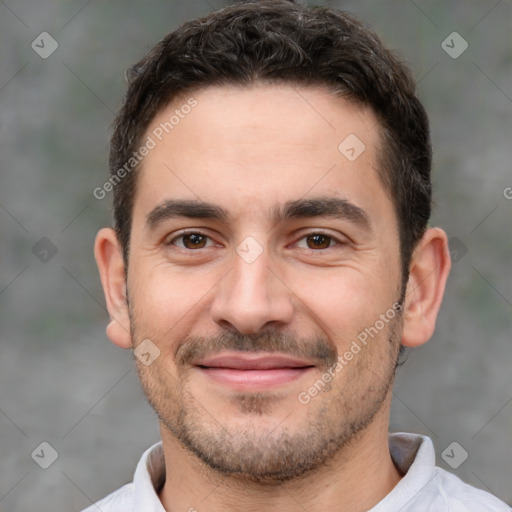 Joyful white adult male with short  brown hair and brown eyes