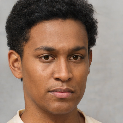Neutral latino young-adult male with short  brown hair and brown eyes