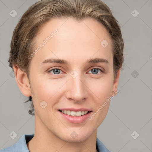 Joyful white young-adult female with short  brown hair and grey eyes