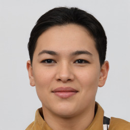 Joyful asian young-adult female with short  brown hair and brown eyes