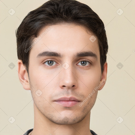 Neutral white young-adult male with short  brown hair and brown eyes