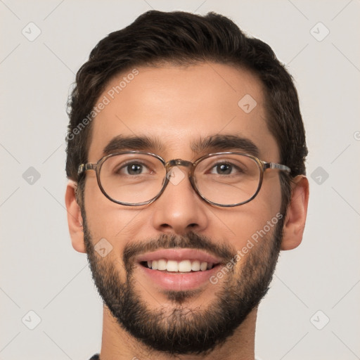 Joyful white young-adult male with short  brown hair and brown eyes