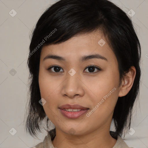 Joyful asian young-adult female with medium  brown hair and brown eyes