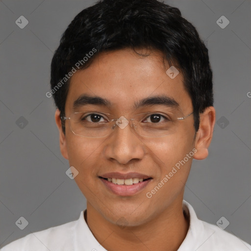 Joyful latino young-adult male with short  black hair and brown eyes