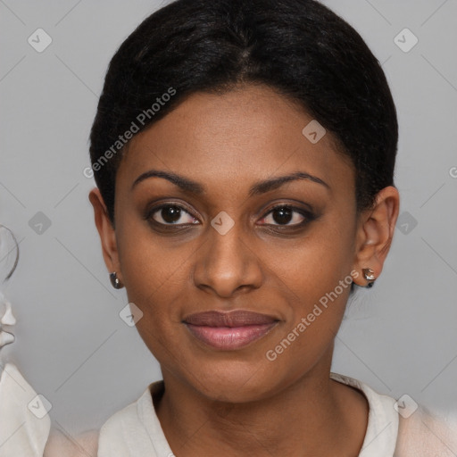 Joyful black young-adult female with short  brown hair and brown eyes