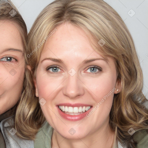 Joyful white young-adult female with medium  brown hair and blue eyes