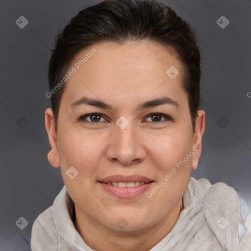 Joyful white adult female with short  brown hair and brown eyes