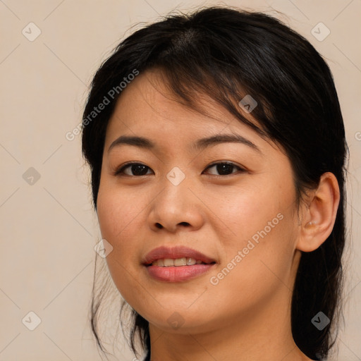 Joyful asian young-adult female with medium  brown hair and brown eyes