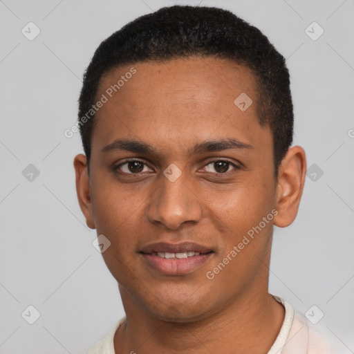 Joyful black young-adult male with short  black hair and brown eyes