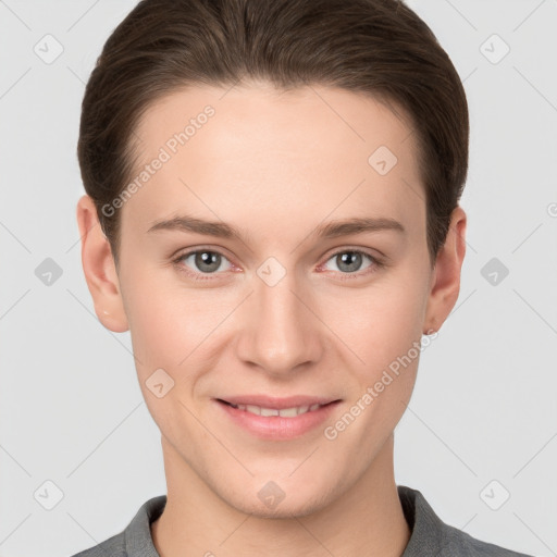 Joyful white young-adult female with short  brown hair and grey eyes