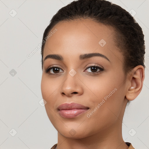 Joyful latino young-adult female with long  brown hair and brown eyes