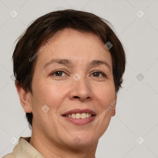 Joyful white adult female with short  brown hair and brown eyes