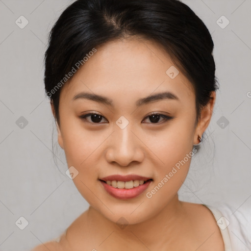 Joyful asian young-adult female with medium  brown hair and brown eyes