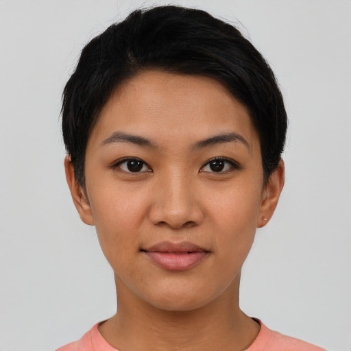 Joyful asian young-adult female with short  black hair and brown eyes