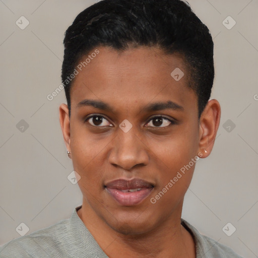 Joyful black young-adult female with short  black hair and brown eyes