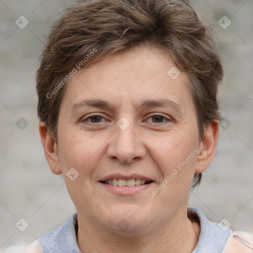 Joyful white adult female with short  brown hair and grey eyes