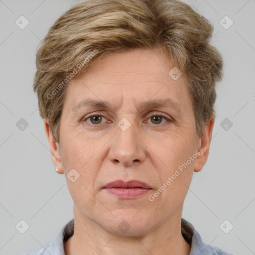 Joyful white adult male with short  brown hair and grey eyes